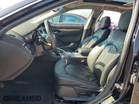 2012 Cadillac CTS z VIN 1G6DC5E56C0138286, wystawiony jako Copart lot #65477135 z przebiegiem 177 194 mil mil oraz Czysty tytuł • Clean title. Historia ofert i sprzedaży dostępna na DreamBid. Obrazek 7.