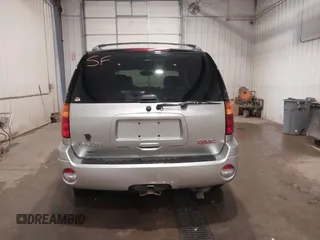 2004 GMC Envoy SLE with VIN 1GKDT13S042243883, listed as a IAAI auction lot 41795335 with 162,873 mi miles. Bid and sale history available at carsss.com. Image 16.