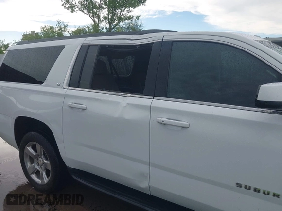 2018 Chevrolet Suburban LT with VIN 1GNSCHKC2JR376239, listed as a IAAI auction lot 42110551 with 123,694 mi miles and . Bid and sale history available at DreamBid. Image 6.
