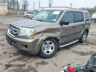 2011 Honda Pilot LX z VIN 5FNYF4H21BB103169, wystawiony jako IAAI lot #41957506 z przebiegiem 124 150 mil mil oraz . Historia ofert i sprzedaży dostępna na DreamBid. Obrazek 2.