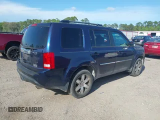 2014 Honda Pilot Touring with VIN 5FNYF4H92EB019248, listed as a IAAI auction lot 41942963 with 136,183 mi miles and . Bid and sale history available at carsss.com. Image 4.