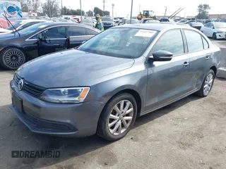 2012 Volkswagen Jetta SE with VIN 3VWDP7AJ6CM071389, listed as a IAAI auction lot 41437389 with 123,792 mi miles and . Bid and sale history available at DreamBid. Image 2.