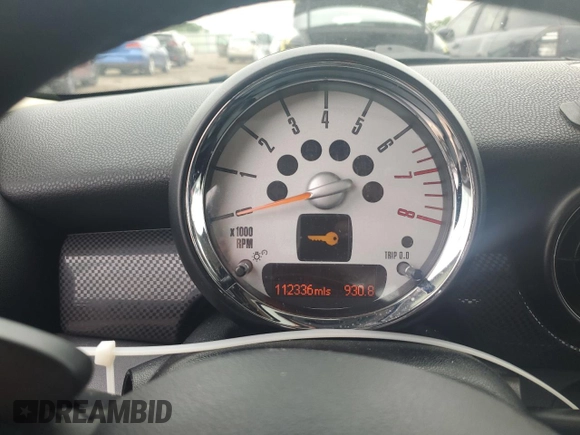 2011 MINI Hardtop S with VIN WMWSV3C58BTY11580, listed as a Copart auction lot 62081615 with 112,336 mi miles and Salvage title. Bid and sale history available at DreamBid. Image 9.