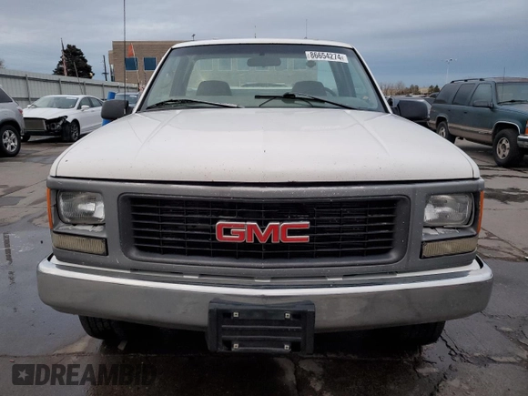 1998 GMC Sierra 1500 with VIN 1GTGC24R0WZ541659, listed as a Copart auction lot 86654274 with 170,193 mi miles and Clean Title. Bid and sale history available at DreamBid. Image 5.