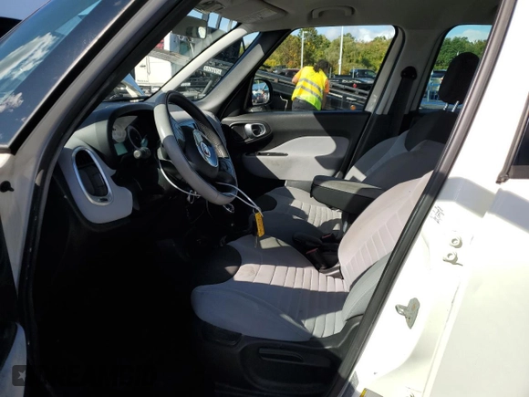 2014 FIAT 500L Easy with VIN ZFBCFABH9EZ024968, listed as a Copart auction lot 73960244 with 203,327 mi miles and Clean Title. Bid and sale history available at carsss.com. Image 7.