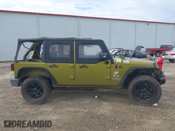 2007 Jeep Wrangler Unlimited X with VIN 1J4GA39177L164566, listed as a IAAI auction lot 42588655 with 50,915 mi miles and . Bid and sale history available at DreamBid. Image 13.