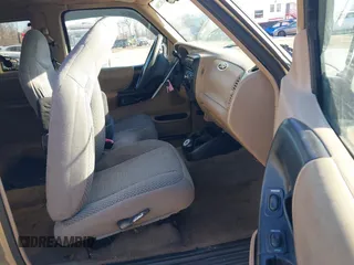 1999 Ford Ranger XLT with VIN 1FTYR14X3XPA62113, listed as a IAAI auction lot 41382306 with 146,086 mi miles. Bid and sale history available at carsss.com. Image 5.