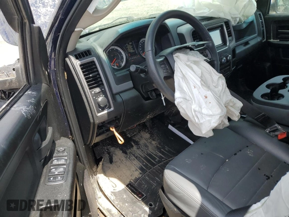 2019 Ram 1500 Tradesman with VIN 1C6RR6FG6KS574296, listed as a Copart auction lot 61586525 with 67,544 mi miles and Salvage title. Bid and sale history available at DreamBid. Image 8.