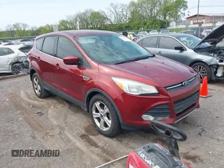 2014 Ford Escape SE with VIN 1FMCU0GX2EUB60526, listed as a IAAI auction lot 42060469 with 128,796 mi miles. Bid and sale history available at carsss.com. Image 1.