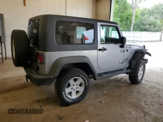 2013 Jeep Wrangler Sport with VIN 1C4GJWAG4DL559422, listed as a Copart auction lot 61454805 with 132,509 mi miles and Salvage title. Bid and sale history available at DreamBid. Image 3.