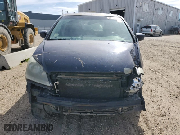 2006 Honda Odyssey EX-L z VIN 5FNRL38706B128265, wystawiony jako Copart lot #58715415 z przebiegiem 377 656 mil mil oraz Szkoda całkowita • Salvage title. Historia ofert i sprzedaży dostępna na DreamBid. Obrazek 5.