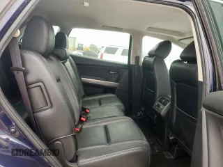 2012 Mazda CX-9 Grand Touring z VIN JM3TB2DA4C0359028, wystawiony jako Copart lot #53816845 z przebiegiem 148 848 mil mil oraz Szkoda całkowita • Salvage title. Historia ofert i sprzedaży dostępna na DreamBid. Obrazek 11.
