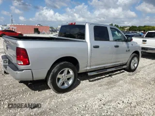 2017 Ram 1500 Express with VIN 1C6RR7KG2HS732427, listed as a Copart auction lot 77602404 with 105,715 mi miles and Salvage title. Bid and sale history available at DreamBid. Image 3.