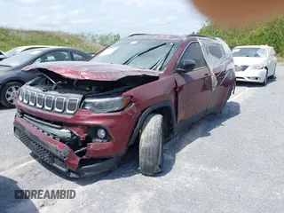 2022 Jeep Compass Latitude with VIN 3C4NJCBB4NT109459, listed as a IAAI auction lot 40406104 with 62,471 mi miles and . Bid and sale history available at DreamBid. Image 2.