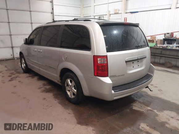 2008 Dodge Grand Caravan SXT with VIN 1D8HN54P18B129536, listed as a IAAI auction lot 41844874 with 260,000 mi miles and . Bid and sale history available at DreamBid. Image 3.