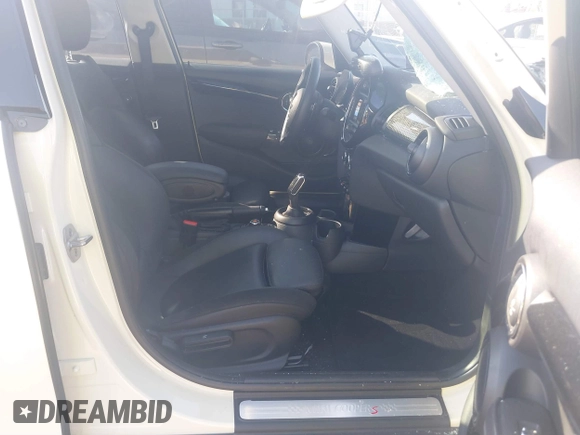 2021 MINI Hardtop 4 Door Cooper S with VIN WMWXU9C00M2P04693, listed as a IAAI auction lot 41785185 with 57,848 mi miles and . Bid and sale history available at DreamBid. Image 5.