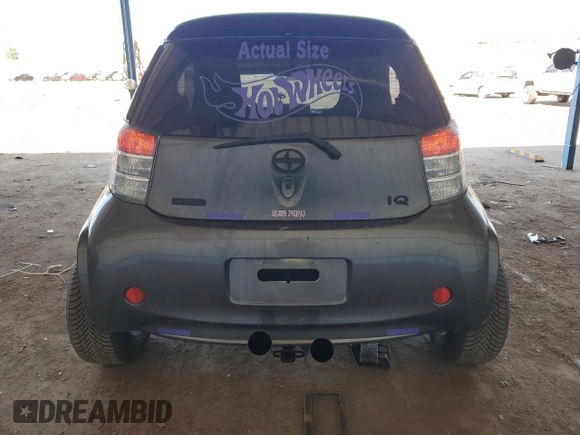 2012 Scion iQ z VIN JTNJJXB09CJ012794, wystawiony jako Copart lot #52983435 z przebiegiem 135 927 mil mil oraz Szkoda całkowita • Salvage title. Historia ofert i sprzedaży dostępna na DreamBid. Obrazek 6.