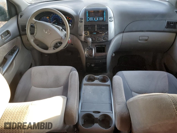2010 Toyota Sienna CE with VIN 5TDKK4CC6AS329753, listed as a Copart auction lot 54374515 with 144,654 mi miles and Salvage Title. Bid and sale history available at DreamBid. Image 8.