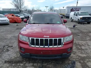 2012 Jeep Grand Cherokee Laredo with VIN 1C4RJFAG7CC221682, listed as a IAAI auction lot 41881922 with 218,762 mi miles. Bid and sale history available at carsss.com. Image 12.
