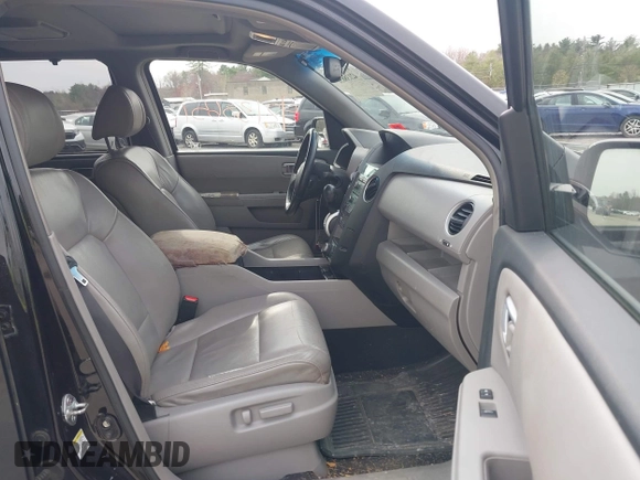 2009 Honda Pilot Touring with VIN 5FNYF48969B055806, listed as a IAAI auction lot 42138651 with 253,623 mi miles and . Bid and sale history available at carsss.com. Image 5.