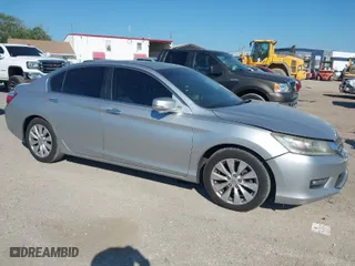 2014 Honda Accord Sedan EX-L with VIN 1HGCR2F85EA019657, listed as a IAAI auction lot 41901065 with 148,584 mi miles. Bid and sale history available at carsss.com. Image 1.
