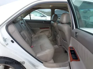 2003 Toyota Camry LE with VIN 4T1BE30K73U227420, listed as a IAAI auction lot 41838940 with 213,470 mi miles and . Bid and sale history available at DreamBid. Image 8.