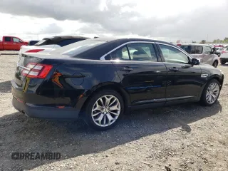 2016 Ford Taurus Limited with VIN 1FAHP2F82GG111485, listed as a Copart auction lot 50736735 with 135,618 mi miles and Salvage Title. Bid and sale history available at DreamBid. Image 3.