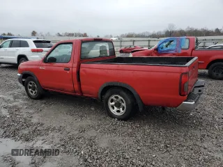 2000 Nissan Frontier XE z VIN 1N6DD21S8YC338304, wystawiony jako Copart lot #83990454 z przebiegiem 184 467 mil mil oraz Szkoda całkowita • Salvage title. Historia ofert i sprzedaży dostępna na DreamBid. Obrazek 2.
