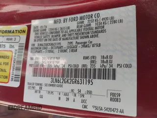 2016 Lincoln MKZ with VIN 3LN6L2GK2GR631195, listed as a IAAI auction lot 42001190 with 66,485 mi miles. Bid and sale history available at carsss.com. Image 9.