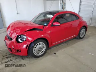 2015 Volkswagen Beetle 1.8T w/Sun z VIN 3VWJ07AT1FM643997, wystawiony jako Copart lot #55326925 z przebiegiem 116 930 mil mil oraz Nie do naprawy • Non repairable. Historia ofert i sprzedaży dostępna na DreamBid. Obrazek 1.