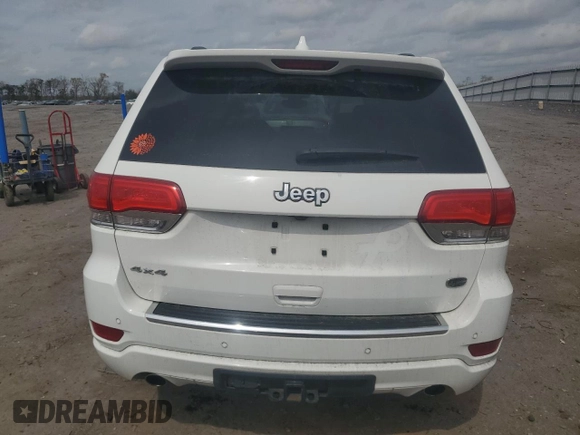 2018 Jeep Grand Cherokee Overland with VIN 1C4RJFCG5JC437508, listed as a Copart auction lot 51814795 with 104,598 mi miles and Salvage title. Bid and sale history available at DreamBid. Image 6.