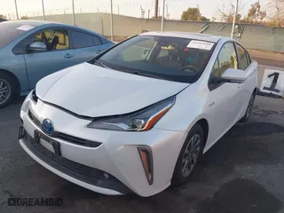 2022 Toyota Prius L Eco with VIN JTDKAMFU1N3181302, listed as a IAAI auction lot 41412650 with 92,397 mi miles. Bid and sale history available at carsss.com. Image 18.