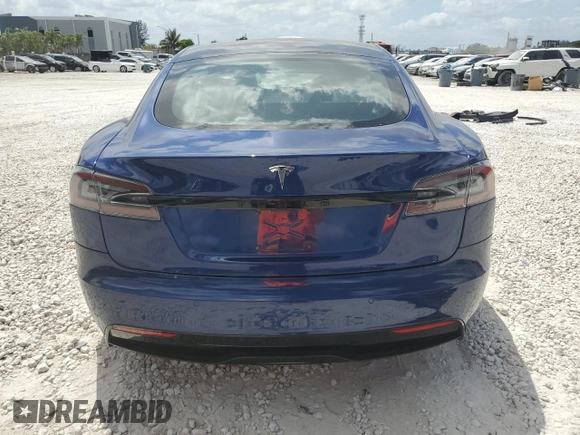 2021 Tesla Model S Long Range с VIN 5YJSA1E50MF452893, выставлен на аукционе Copart как лот 54139865 с пробегом 56 410 миль миль и Списание • Salvage title. История ставок и продаж доступна на DreamBid. Изображение 6.