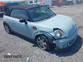 2014 MINI Convertible z VIN WMWZN3C51ET569556, wystawiony jako IAAI lot #42176151 z przebiegiem 158 846 mil mil oraz . Historia ofert i sprzedaży dostępna na DreamBid. Obrazek 1.