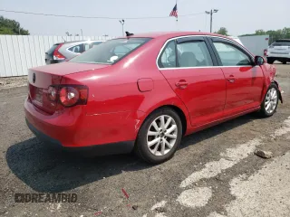 2010 Volkswagen Jetta SE with VIN 3VWRZ7AJ4AM059304, listed as a Copart auction lot 59497295 with 114,957 mi miles and Salvage title. Bid and sale history available at DreamBid. Image 3.