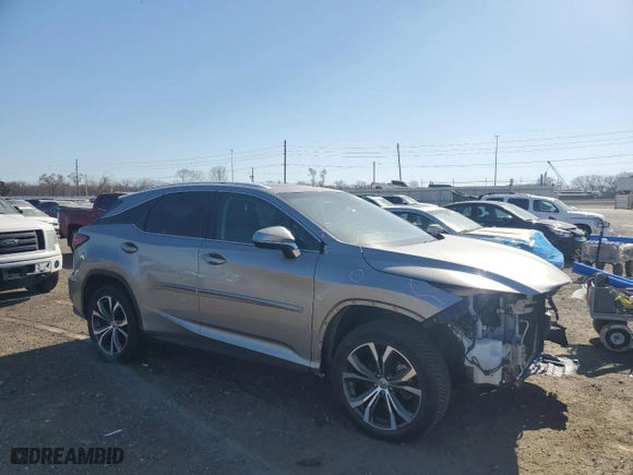 2017 Lexus RX with VIN 2T2BZMCA7HC109479, listed as a Copart auction lot 50387905 with 56,744 mi miles and Salvage Title. Bid and sale history available at carsss.com. Image 4.