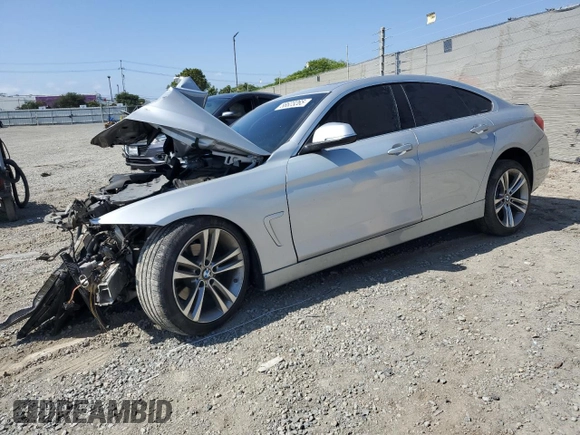2018 BMW 4 Series 430i with VIN WBA4J1C55JBG75988, listed as a Copart auction lot 58623265 with 71,976 mi miles and Salvage title. Bid and sale history available at DreamBid. Image 1.