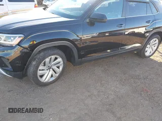 2021 Volkswagen Atlas SE with VIN 1V2WE2CA2MC221789, listed as a IAAI auction lot 41308009 with 53,627 mi miles and . Bid and sale history available at DreamBid. Image 6.