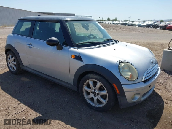 2007 MINI Hardtop with VIN WMWMF33547TL77235, listed as a IAAI auction lot 42547245 with 144,179 mi miles and . Bid and sale history available at DreamBid. Image 1.