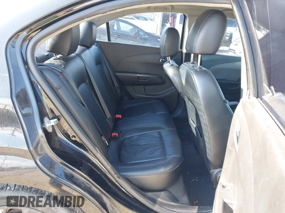 2012 Chevrolet Sonic LTZ z VIN 1G1JE5SH0C4154929, wystawiony jako IAAI lot #42191912 z przebiegiem 154 807 mil mil oraz . Historia ofert i sprzedaży dostępna na DreamBid. Obrazek 8.