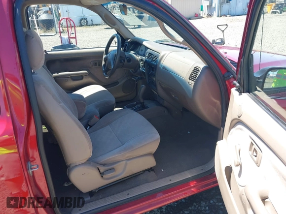 2003 Toyota Tacoma z VIN 5TEVL52N43Z228204, wystawiony jako IAAI lot #39725557 z przebiegiem 180 595 mil mil oraz . Historia ofert i sprzedaży dostępna na DreamBid. Obrazek 5.
