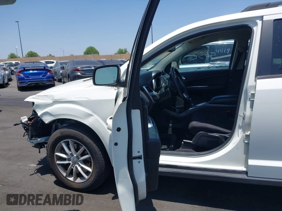 2013 Dodge Journey SXT with VIN 3C4PDCBG4DT696966, listed as a IAAI auction lot 42555632 with 144,927 mi miles and . Bid and sale history available at DreamBid. Image 5.