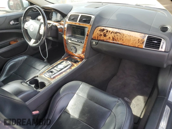 2010 Jaguar XK with VIN SAJWA4GB1ALB36227, listed as a Copart auction lot 79747174 with 232,406 mi miles and Clean Title. Bid and sale history available at carsss.com. Image 8.