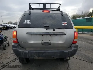 2001 Jeep Grand Cherokee Laredo with VIN 1J4GW48SX1C607432, listed as a Copart auction lot 51649365 with 296,308 mi miles and Salvage Title. Bid and sale history available at carsss.com. Image 6.