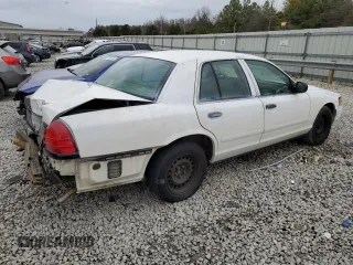 2001 Ford Crown Victoria Police Police Interceptor with VIN 2FAFP71W01X165220, listed as a Copart auction lot 43380784 with 155,877 mi miles and Salvage Title. Bid and sale history available at carsss.com. Image 3.