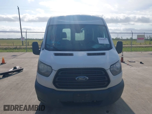 2018 Ford Transit z VIN 1FTYR2CM3JKA19554, wystawiony jako IAAI lot #42058523 z przebiegiem 372 734 mil mil oraz . Historia ofert i sprzedaży dostępna na DreamBid. Obrazek 12.
