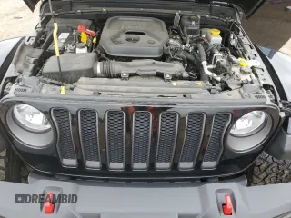 2021 Jeep Wrangler Unlimited Rubicon z VIN 1C4HJXFN1MW793064, wystawiony jako Copart lot #55643305 z przebiegiem 51 944 mil mil oraz Szkoda całkowita • Salvage title. Historia ofert i sprzedaży dostępna na DreamBid. Obrazek 11.
