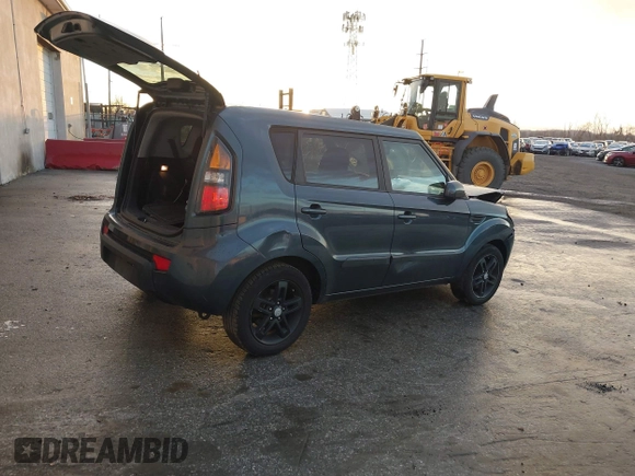 2011 Kia Soul + with VIN KNDJT2A26B7258864, listed as a IAAI auction lot 41068819 with 244,397 mi miles. Bid and sale history available at carsss.com. Image 4.