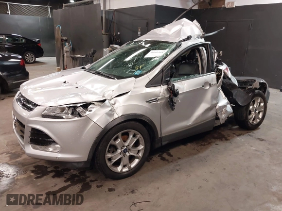 2016 Ford Escape Titanium with VIN 1FMCU9J94GUB00815, listed as a IAAI auction lot 40893687 with 152,891 mi miles. Bid and sale history available at carsss.com. Image 2.