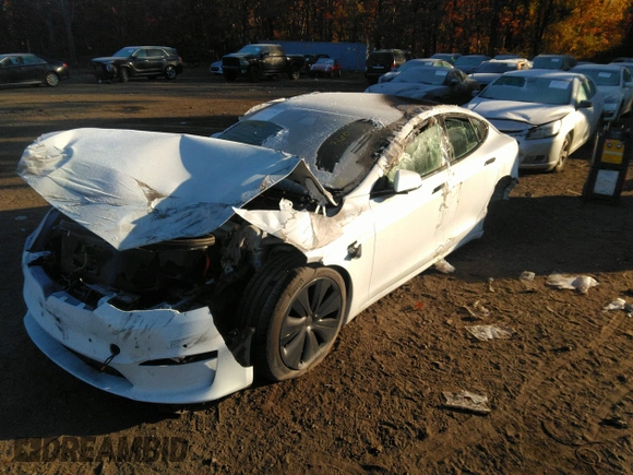 2022 Tesla Model S with VIN 5YJSA1E54NF488023, listed as a IAAI auction lot 36074023 with 200 mi miles and . Bid and sale history available at DreamBid. Image 16.